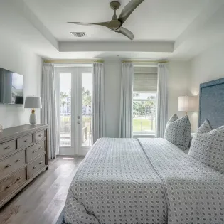 4 designer gulf place condo 101 primary bedroom