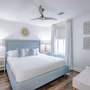 5 designer gulf place condo 101 primary bedroom1