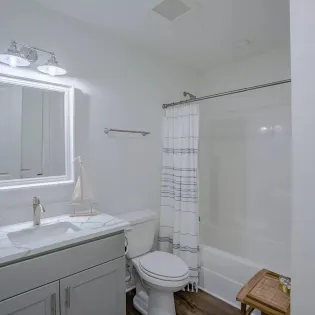 8 designer gulf place condo 101 primary bathroom1